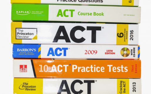 South Lyon, Michigan -December 29, 2022 : Stack of ACT books contain standardized practice tests for university admissions in USA.