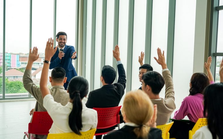 conference meeting. Business people sitting in a room listening to the motivator coach. Representation of a Self-growth and improvement special event