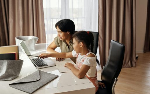 mother-helping-her-daughter-with-her-homework-4260323
